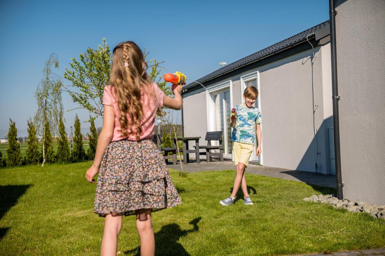 Scandi Village Zator Bagian luar foto